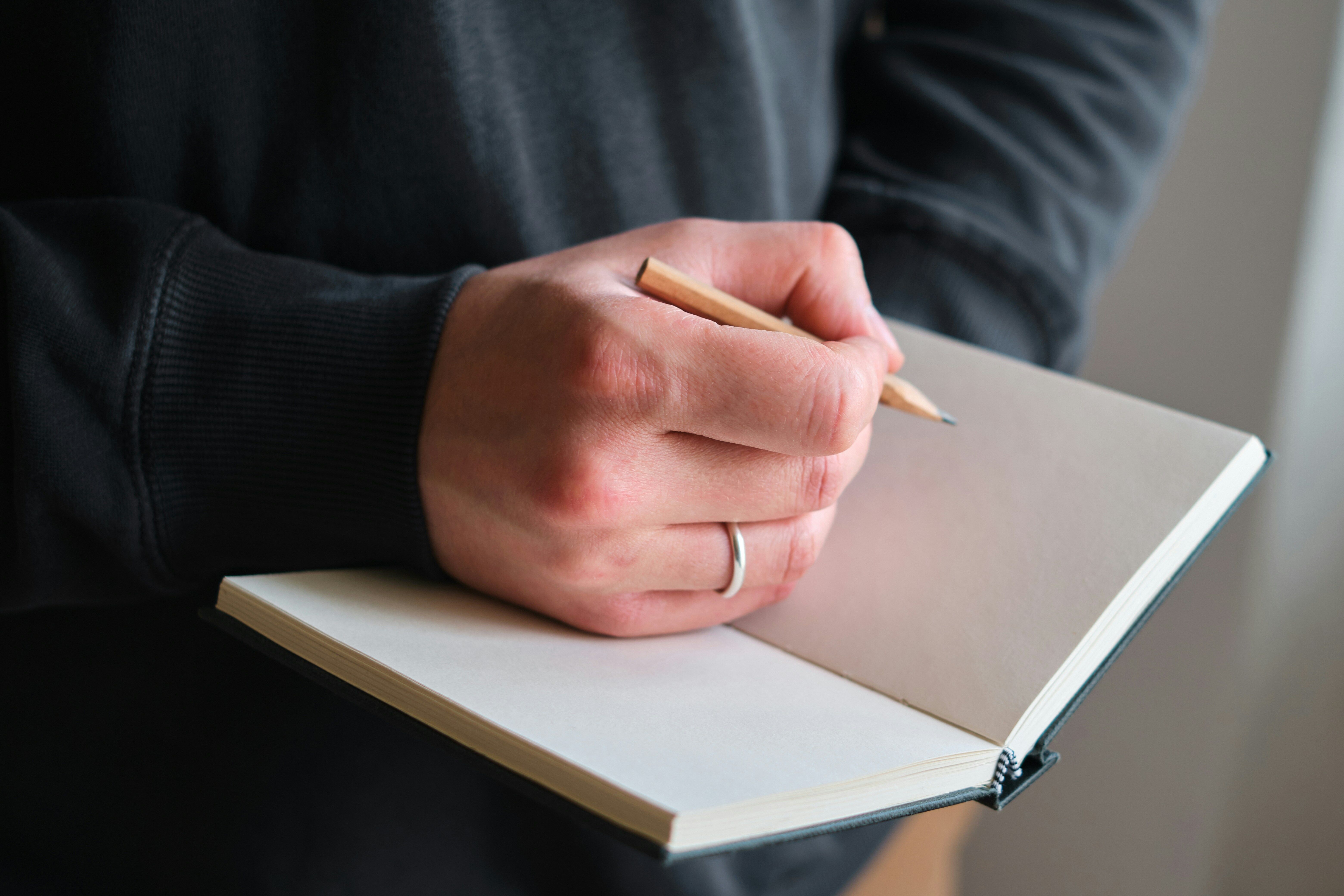 A person holding a checklist for IT strategy